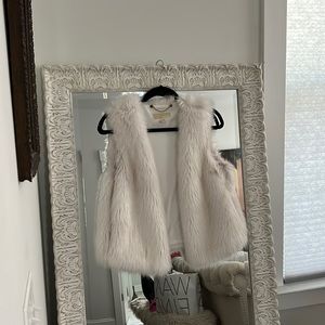 White faux fur vest